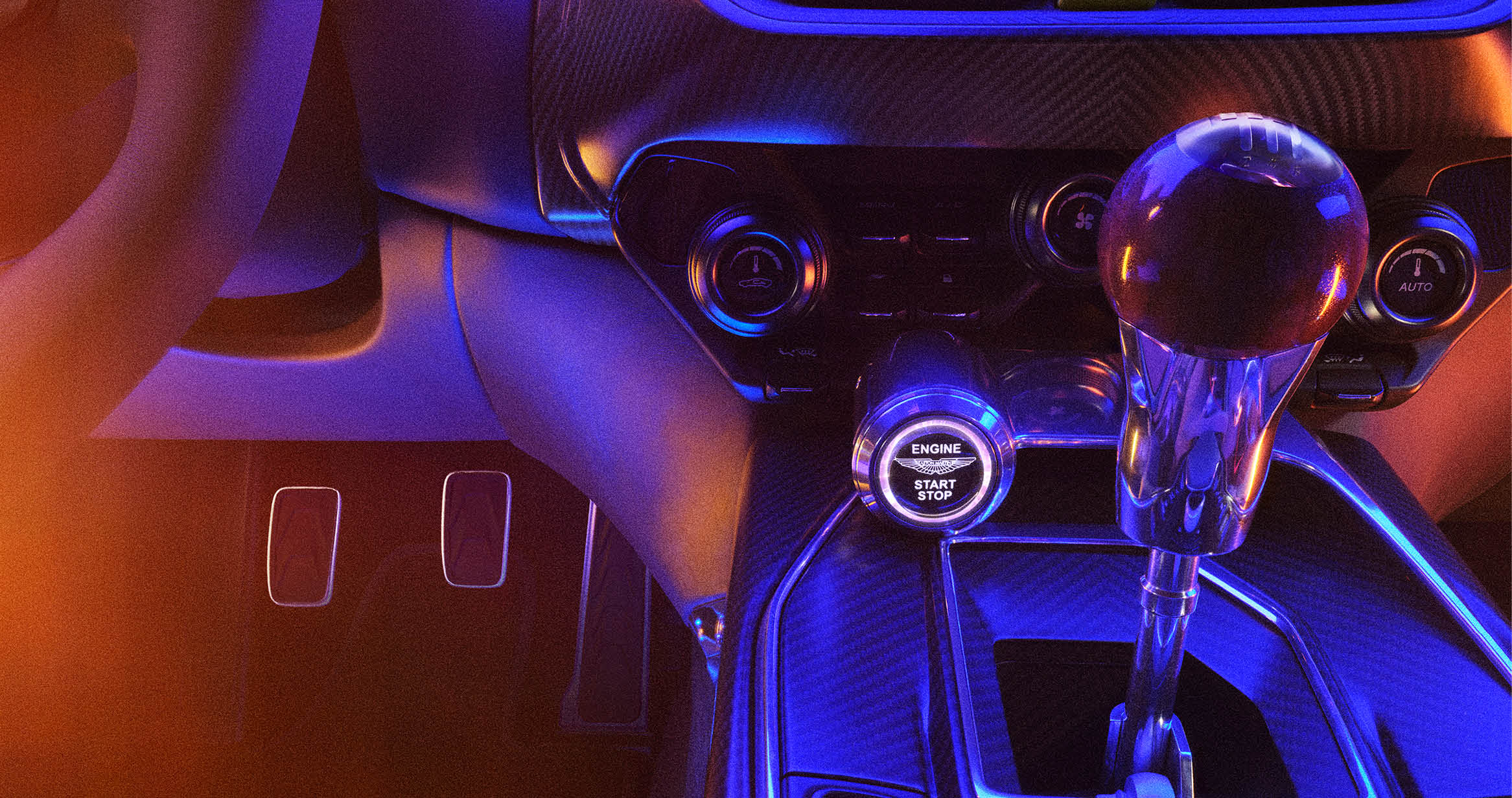 Shifter knob with carbon fiber material and push to start button