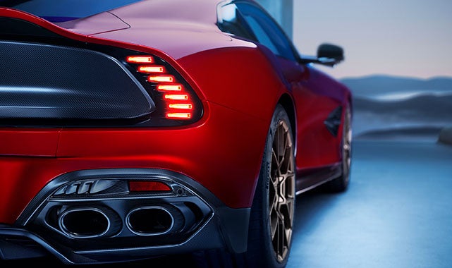 The
lightweight carbon fiber body and quad exhausts enhance its
aggressive presence