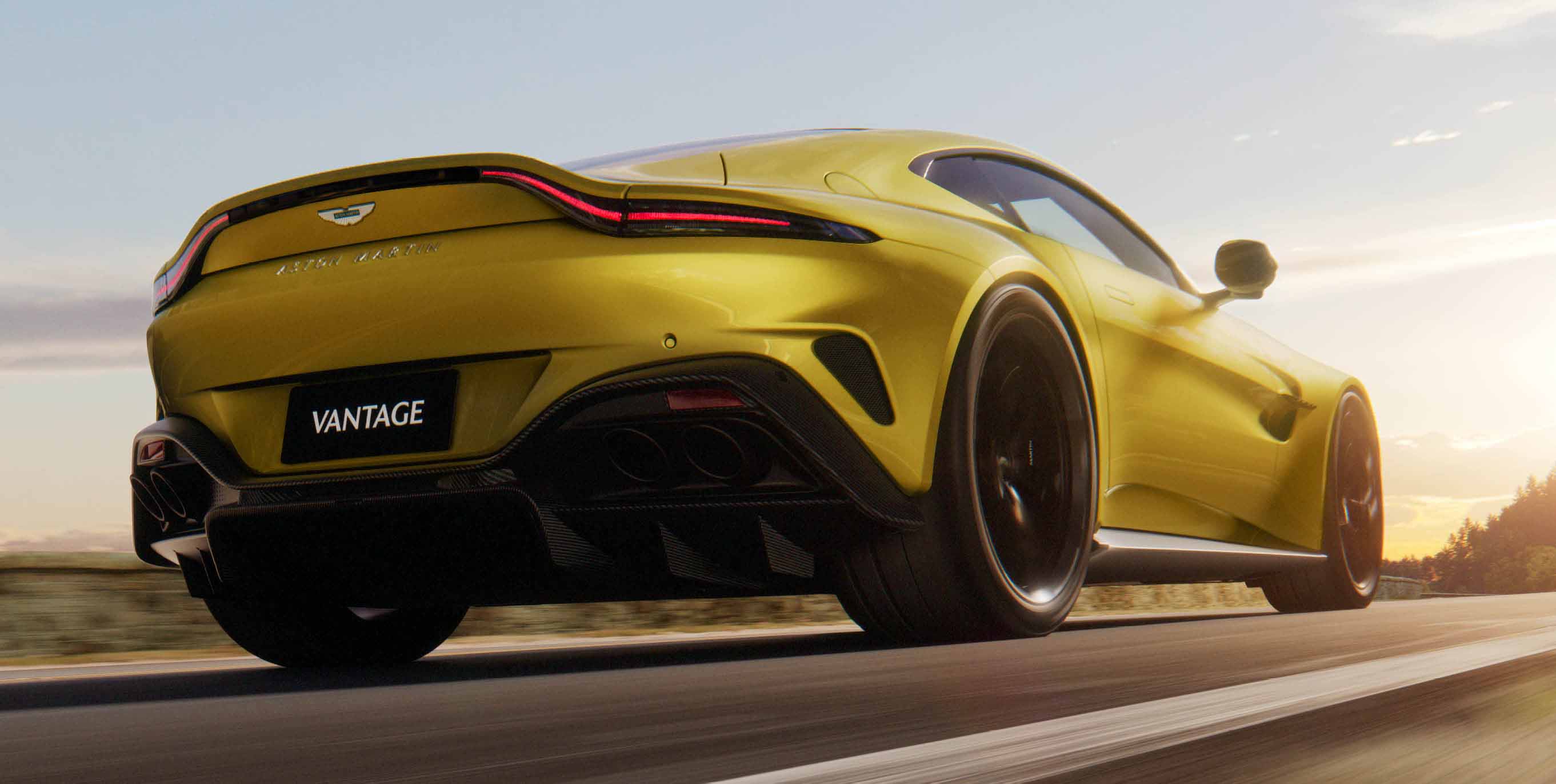 Rear exhaust of the new Vantage driving away at high speeds